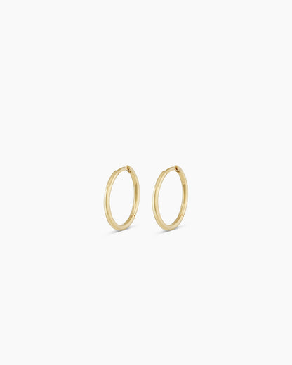 Woman wearing Classic Gold Huggie || option::14K Solid Gold, 11mm