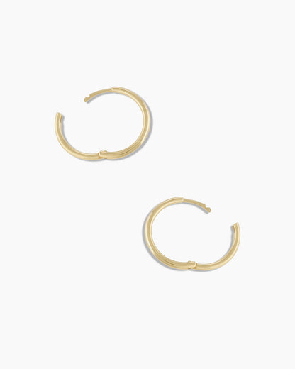 Woman wearing Classic Gold Huggie || option::14K Solid Gold, 11mm